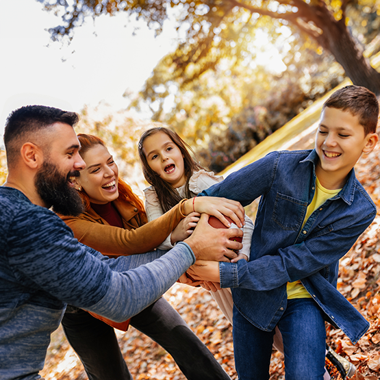 Family playing football